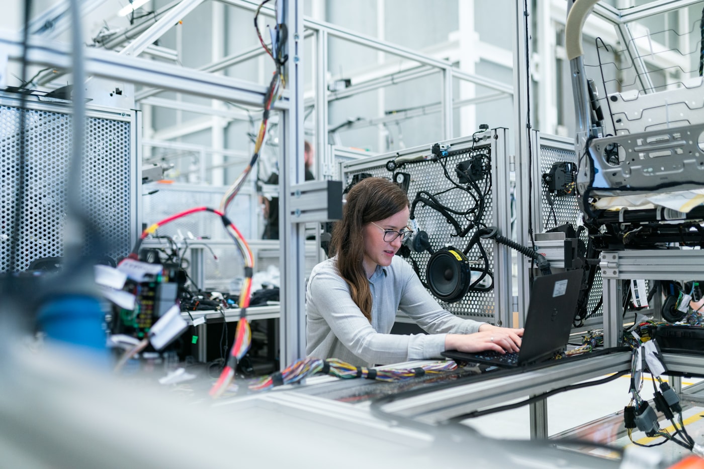 KLOQ engineer testing devices in the QC lab